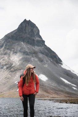 Hiker Exploring Scenic Trail Near Norwegian Peak clipart