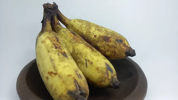 fresh bananas on a black background