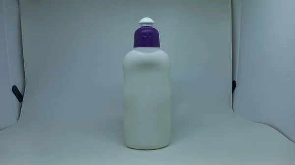 white bottle with a white background