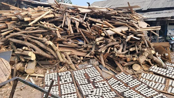 piles of firewood for traditional industries