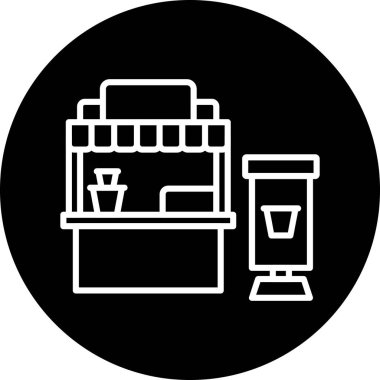 Kahve tezgahında içecek dağıtıcısı var.