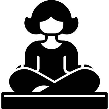 Kız lotus pozisyonunda oturuyor ve yoga yapıyor.