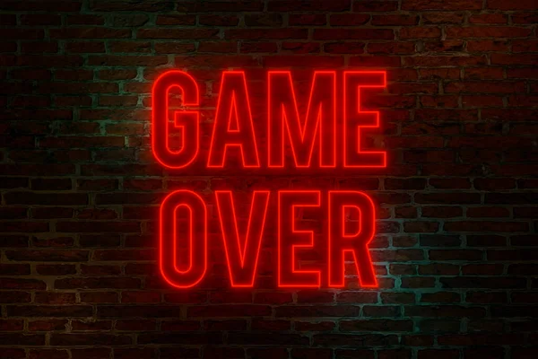 Game over, neon sign. Brick wall at night with the text \