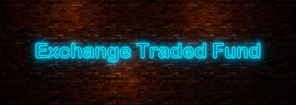 ETF - Exchange-Traded Fund. Brick wall with blue glowing letters. Stock Exchange, investment, trading and financial business concept. 3D illustration