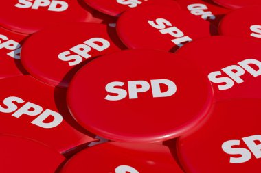 SPD - Almanya Sosyal Demokrat Partisi. Siyaset, kampanya düğmesi masada. SPD, sosyal demokrat parti, Alman hükümetinin bir parçası..