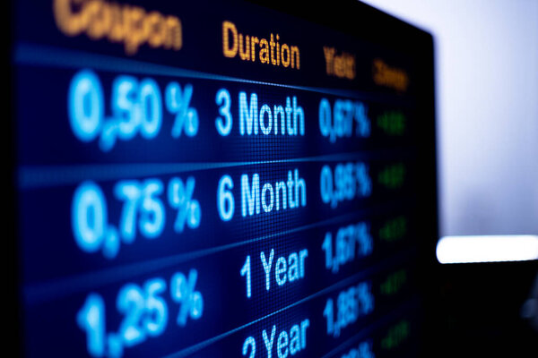 Screen with rising interest rates. Close up computer monitor with rising yields and rates. financial business, mortgage rates, debt financing and banking industry.