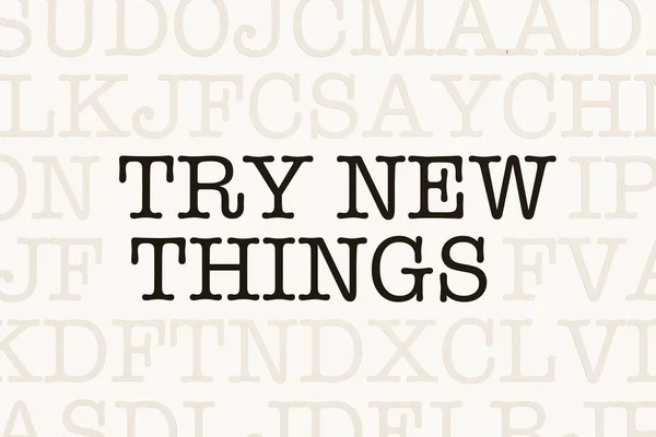 Try new things. Page with letters in typewriter font. Part of the text in dark color. Opportunity, chance, motivation, new beginning, the way forward, change, check out, inspiration and test.