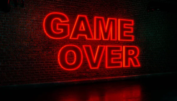Game Over. Text illuminated  in red glowing capital letters against brickwall. Leisure activity, game night, fun and playing games. 3D illustration