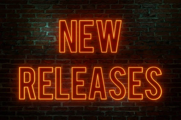 New releases. Brick wall at night, illuminated neon text \