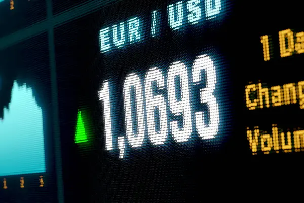 Euro - US dollar exchange rate. EUR rises against USD. Currency trading,  business, investment, stock market and exchange.