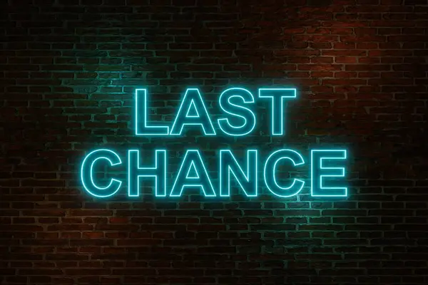 Last chance. Brick wall at night with neon sign, text \