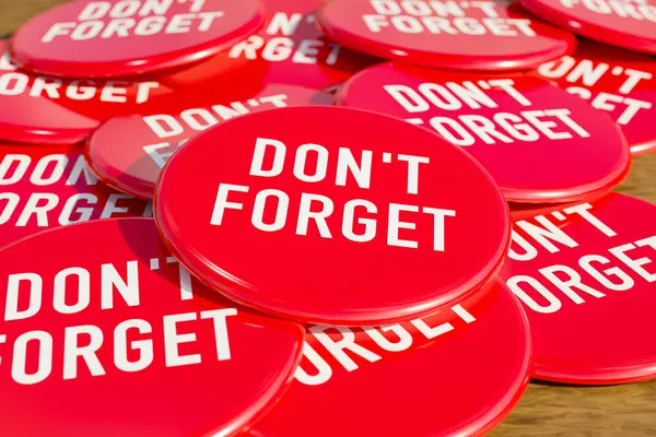 Don\'t forget. Red badges laying on the table with the message \