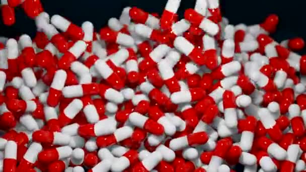 赤いカプセル 薬が箱に落ちる 医薬品 抗生物質 その他の薬物の産業生産 — ストック動画