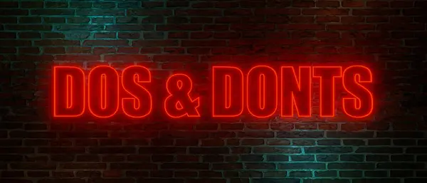 Dos和Donts 夜间用红色霓虹灯字母写着 Dos Donts 的砖墙 3D插图 — 图库照片