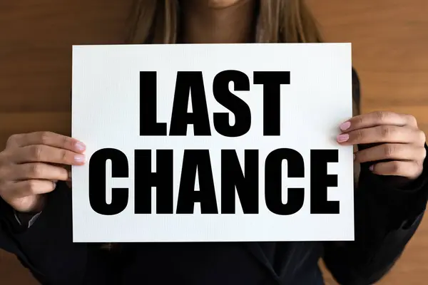 Last chance. Woman with white page, black letters. Opportunity, urgency, liking, shopping, want something.