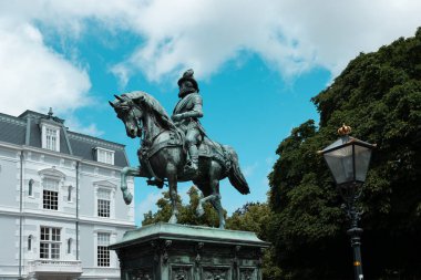 The Hague, Netherlands - July 10, 2024: Bronze equestrian statue of Prins Willem the 1st in The Hague from 1845. clipart