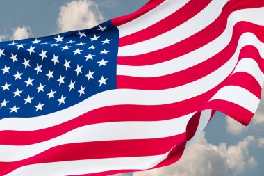 Close up waving flag of the United States of America. Blue sky with clouds in the background. Travel, tourism, journey, country, tour, holiday, trip, destination, vacation. 3D illustration