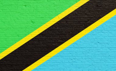 Tuğla bir duvara Tanzanya bayrağı boyanmış. Ulusal renkler, ülke, bayrak, hükümet, Tanzanya kültürü, siyaset.