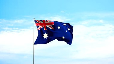Bulutlu gökyüzüne karşı Avustralya bayrağı. Avustralya bayrağı rüzgarda dalgalanıyor, ulusal bir sembol. Ülke, ulus, birlik, bayrak, hükümet, Avustralya kültürü, siyaset.