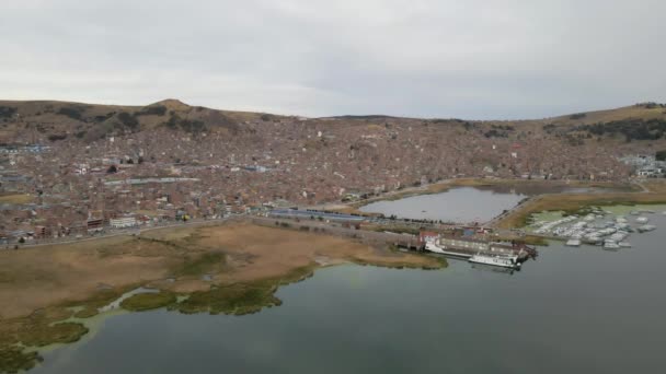 Aerial Drone Orbit Arc Lake Titicaca Puno Peru City Pier — Stock Video