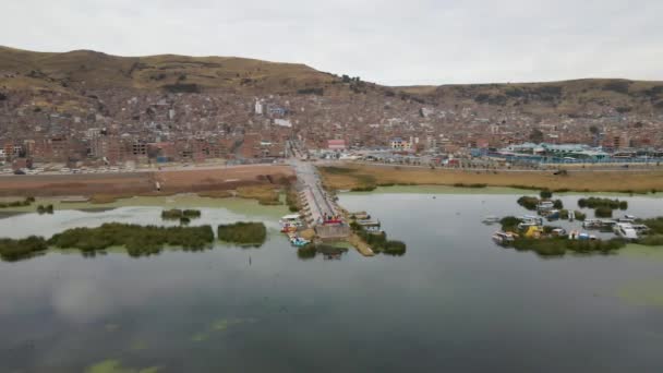 Aerial Drone Orbit Arc Pier Lake Titicaca Puno Peru Morning — Stock Video