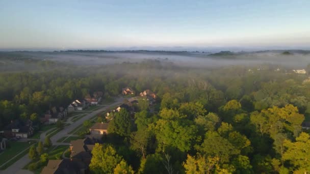 Aerial Drone Foggy Affluent Neighborhood Morning Time Houses Pools Visible — Stock Video