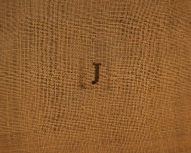 J harfi. Keten kumaşa damga harfleri