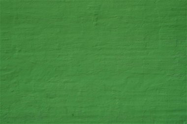 Duvarda eski yeşil alçı var. Dekoratif alçı yapı arkaplanı.