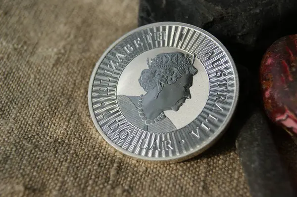 Australian 1 Dollar Silver investment coin. Coin with portrait of the Queen Elizabeth II.