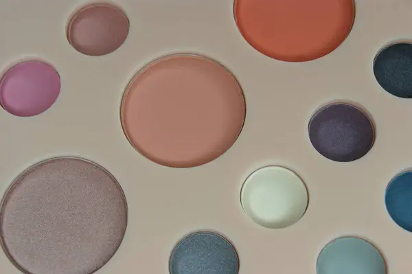 Multi-color makeup palette close up.