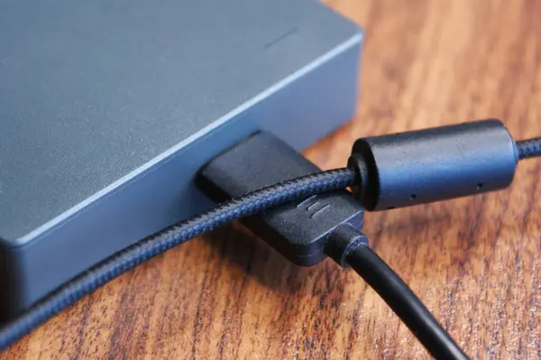External hard drive with cables close-up.