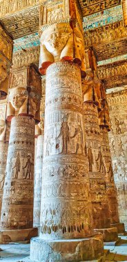 The Great Hypostyle hall with soaring columns with four-faced carvings of Hathor in the Temple of Hathor at Dendera completed in the Ptolemaic era around 50 BC between Luxor and Abydos towns,Egypt clipart