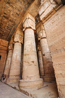 Superb soaring columns topped by four-faced Hathor Heads and vibrant ceiling art in the Temple of Hathor at Dendera completed in the Ptolemaic era around 50 BC between Luxor and Abydos towns,Egypt clipart