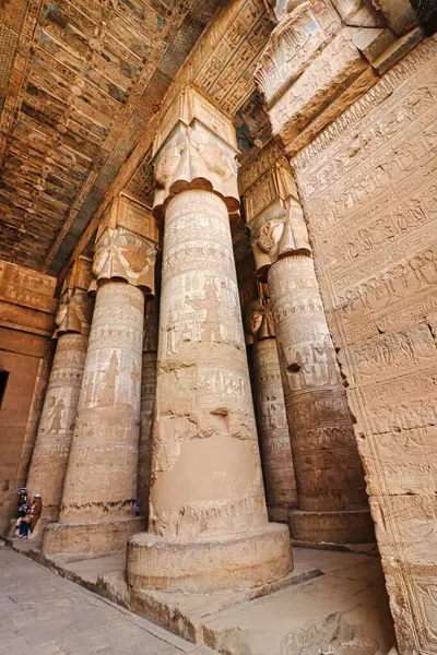 stock image Superb soaring columns topped by four-faced Hathor Heads and vibrant ceiling art in the Temple of Hathor at Dendera completed in the Ptolemaic era around 50 BC between Luxor and Abydos towns,Egypt