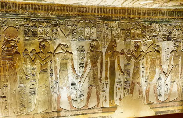 stock image Wall reliefs from Belzoni's  Room of beauties showing Seti I before Hathor,Horus,Isis and Anubis in the Tomb of Seti I, KV17 at the Theban necropolis in the Valley of Kings in Luxor,Egypt