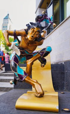 Le Grand Bienvenue monument,bronze sculpture by Nicole Taillon evoking a King's Jester in 1994 on Pierre Olivier Chauveau Street in Quebec city, the capital of Quebec province,Canada clipart