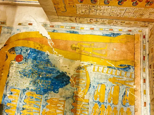 stock image Beautiful relief in golden color depicting Ramesses travelling with the God Nut in heavens with scenes from the Book of the Night in the Tomb of Ramesses IV,KV2, in the Valley of Kings,Luxor,Egypt