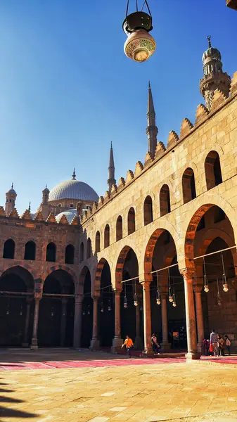 Stock image View of the courtyard of the Al Nasir Muhammad Mosque with the minarets of the Muhammed Ali mosque visible in the background at the Citadel of Saladin in Islamic Cairo,Egypt