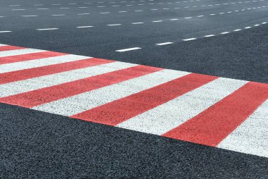 Road markings on a city highway. Roads infrastructure and transport