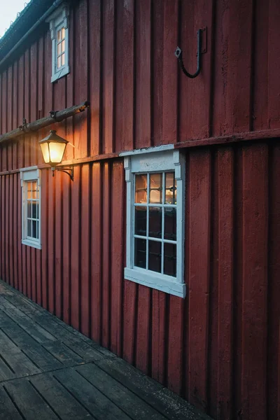 stock image historic red wooden building with white windows detail. High quality photo