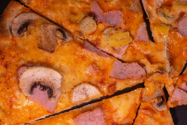 stock image Pizza baked for young people with ham, fresh and pickled champignons, cheese