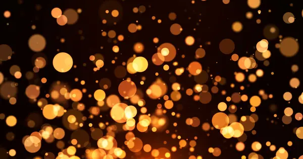 Altın parçacıkları olan soyut arkaplan, koyu arkaplanda parlayan parçacıkları olan altın ışık, noel konsepti