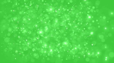 Soyut parlayan parçacıklar düşen parlak peri masalı parıldayan yıldızlar ve parıltılar. Sihirli ışıltılı, ışıltılı yağmur. Chromakey - Yeşil Ekran. Tatil, yeni yıl ve Noel geçmişi. Kusursuz döngü