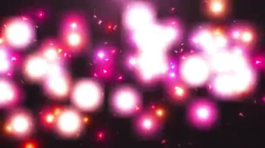 Soyut parlayan pembe ve turuncu Bokeh ışıkları ve koyu arkaplanda uçan üçgen parçacıklar. Parti, kutlama, şenlik, tatil veya romantik sinema için mükemmel.