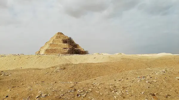 The six steps pyramid in the desert landscape, Saqqara, Egypt.