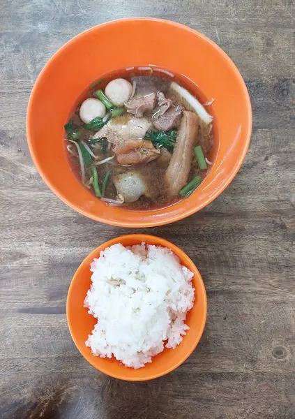 stock image Thai Lunchtime Delight: Beef Stew Soup, Rice and Meatballs