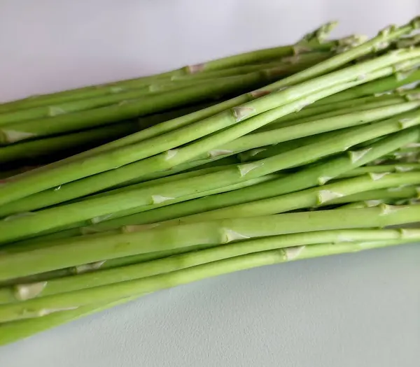 stock image Fresh Green Asparagus Bunch on White Background