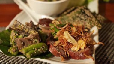 Luang Prabang tarzındaki aperatifler eşsiz tatları ve aşçılık geleneklerini ön plana çıkarıyor.