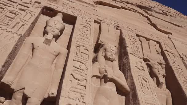 Close up of Ramses and Nefertari statues at Abu Simbel Close up of Ramses and Nefertari statues at Abu Simbel