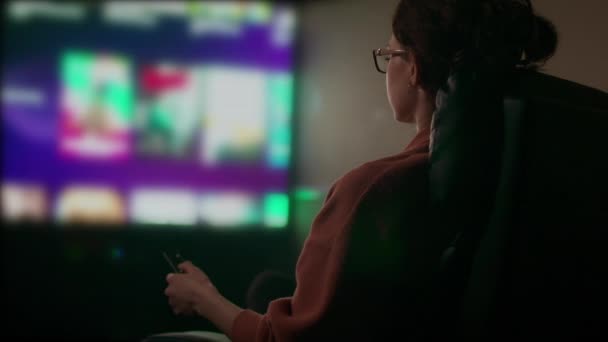 Close Pan Caucasian Woman Browsing Television Guide Streaming App Розстріляний — стокове відео